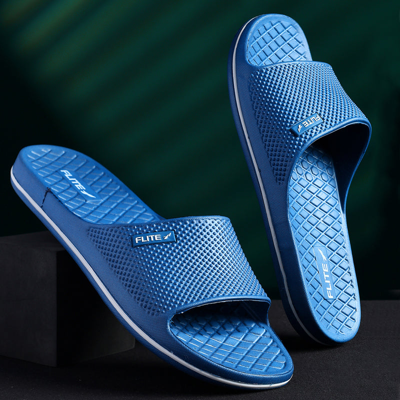 Attractive image of Slides For Men Blue with Flite logo appear on the bottom and the strip with white background comfortable to wear with cushioning. One on one  image with up and down appearance. 