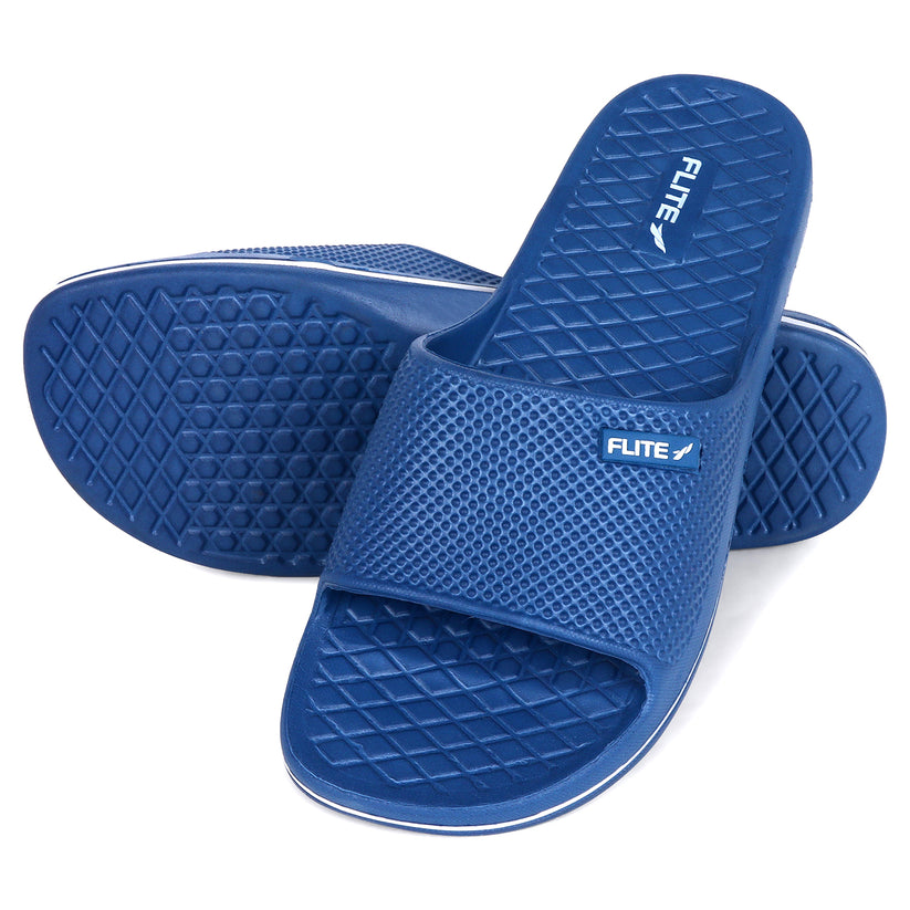 Blue slippers for men up and down with white flite logo available on above with white background with clear image and visibility. 