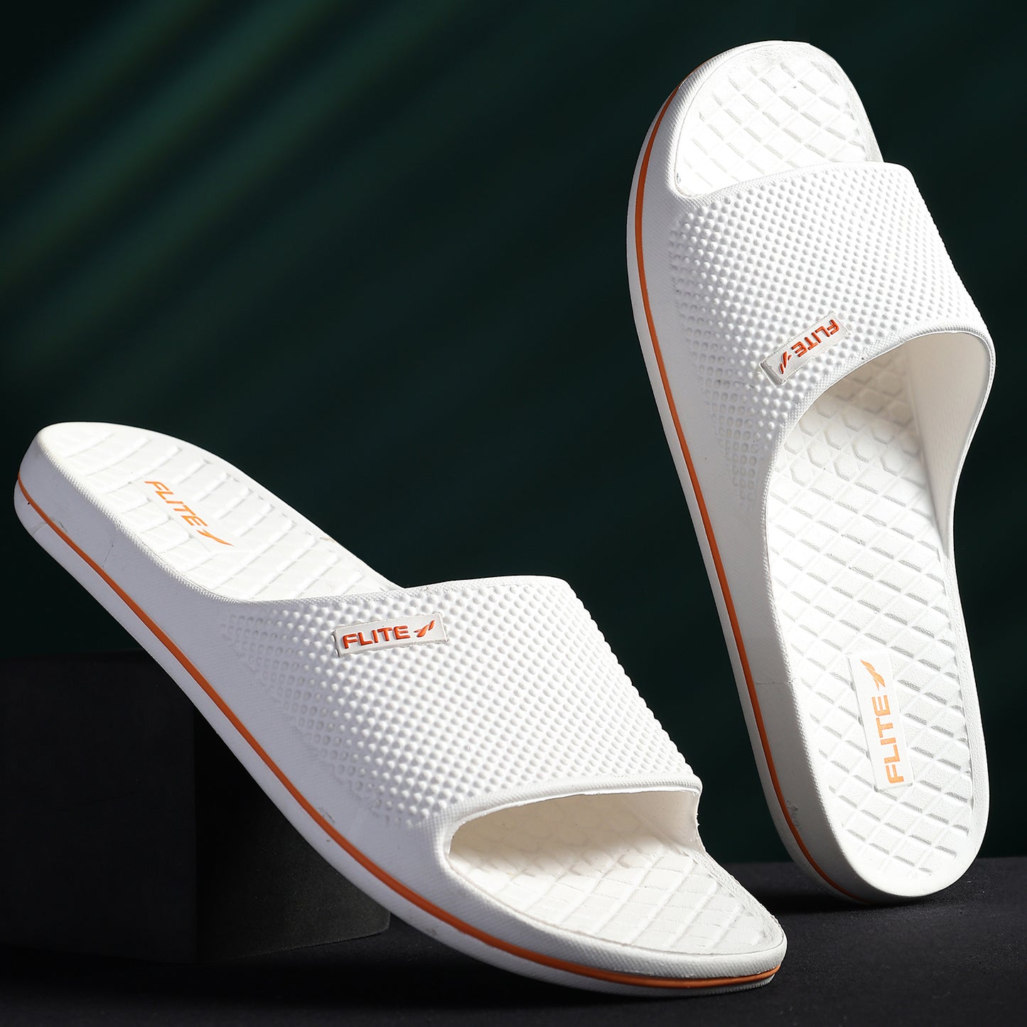 One by One down and up Image of Attractive, beautiful and comfortable white flite slide & slippers for men with orange colour flite logo and white background. 