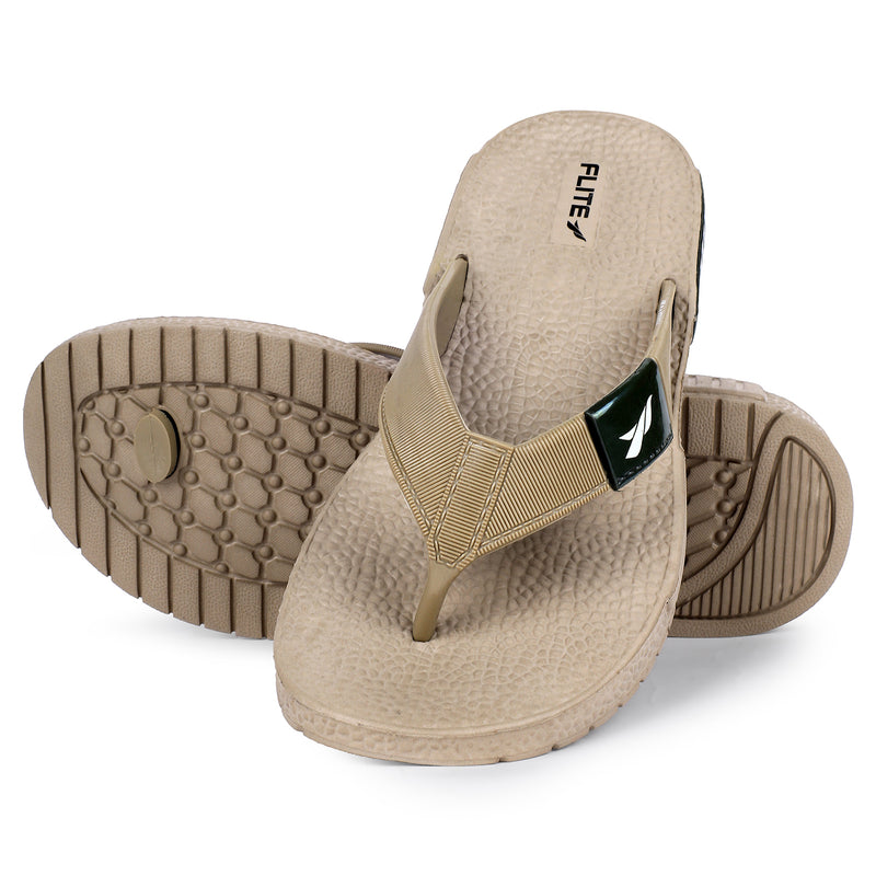 One on one image of flite one over one, image of A close up slight high angle shot of single color men's flip flop sandal by flite. The sandal has a textured, slightly bumpy footbed and a thick durable looking sole. The thong strap is wide an also textured with horizontal ridges. 