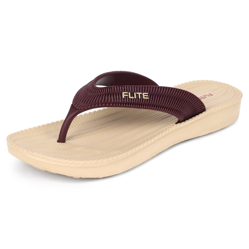 Image of Flite Flip Flops For Women Slippers with brown strip on it. With white background the flip flop or slippers looks good like never before. 