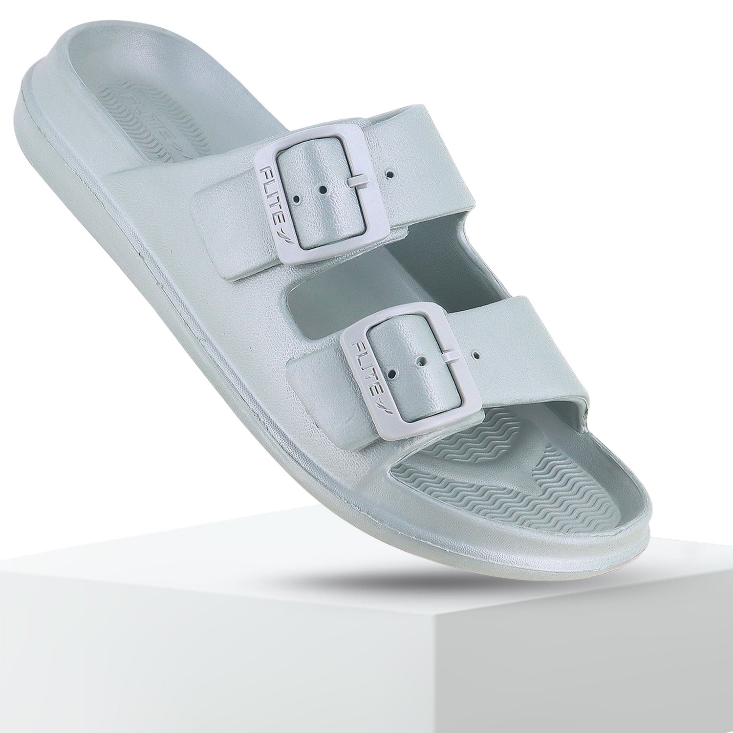 FLITE light blue/mint green double-strap slide sandal with adjustable white buckles.