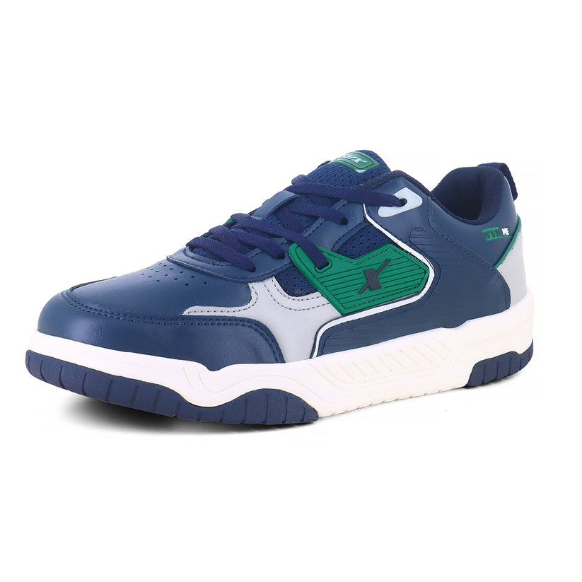 Image of Sneakers for Men by Sparx , blue sneaker with green logo of sparx writing X on it and the bottom is white with non slip grip of blue comfortable to wear for men of all age and affordable. 