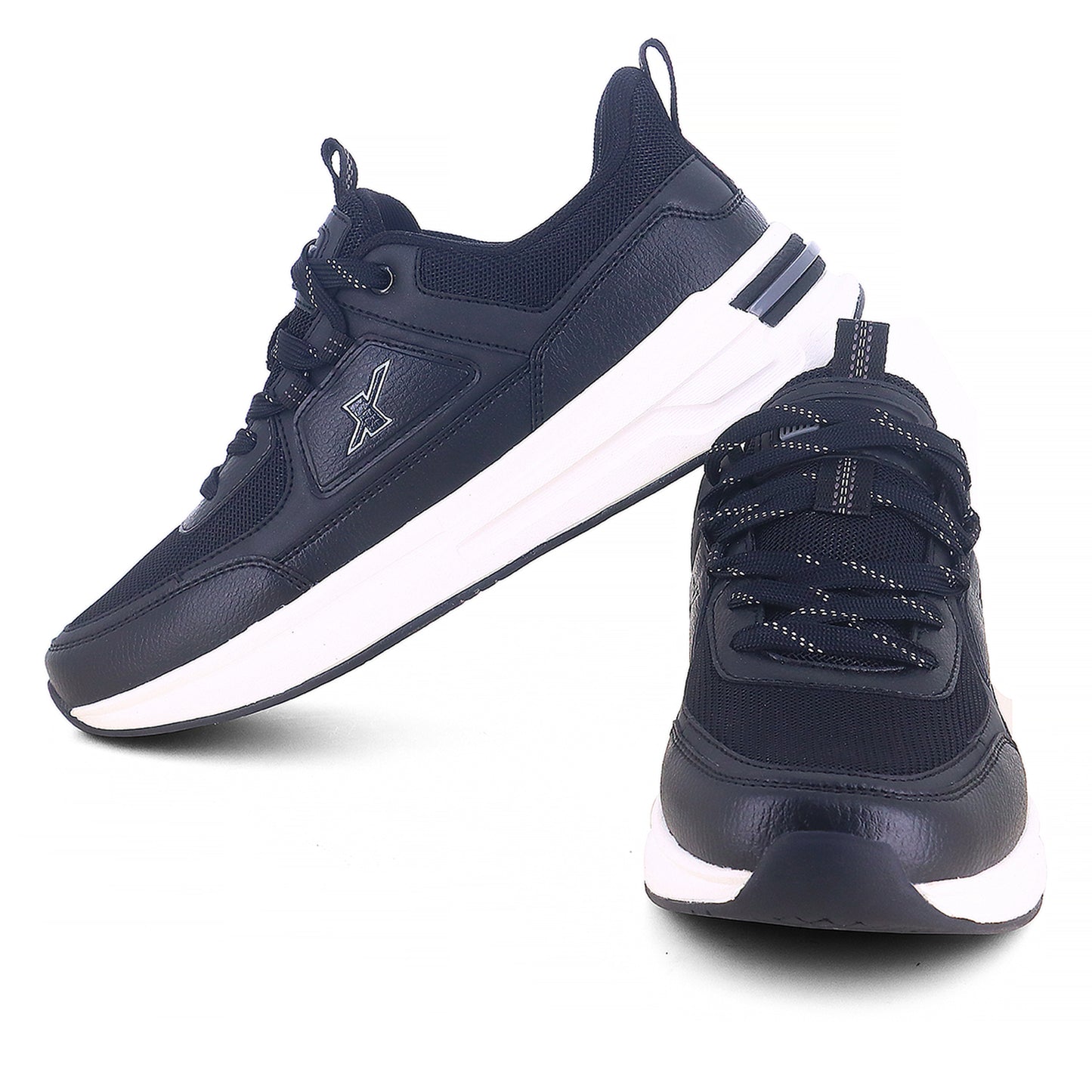 Up and down from backside Image of black sparx shoes for men with white bottom and white background with shadow at the bottom which is comfortable to wear. 