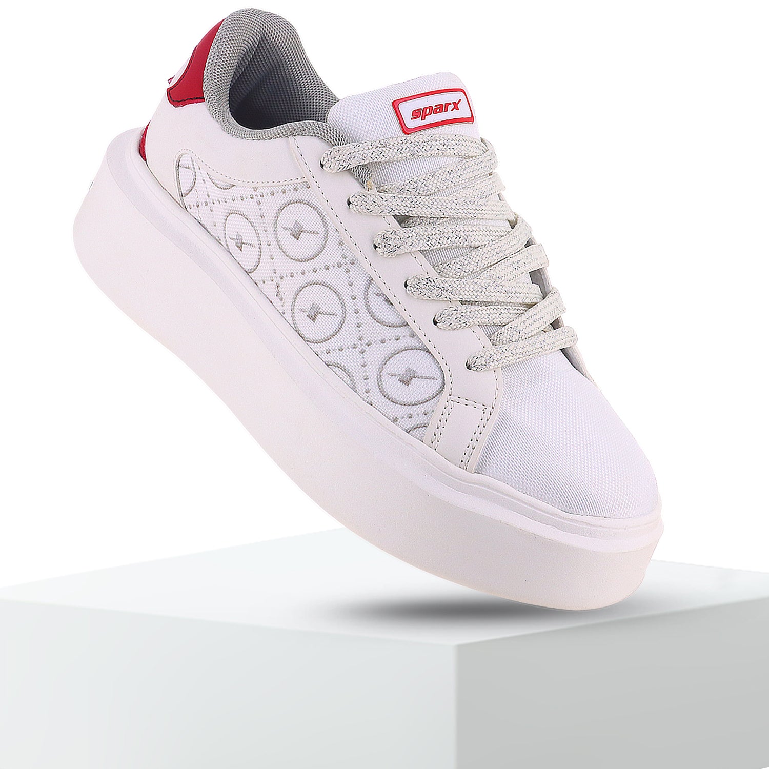 Side view of Attractive and beautiful white Sneakers for Men with X written on it. 
