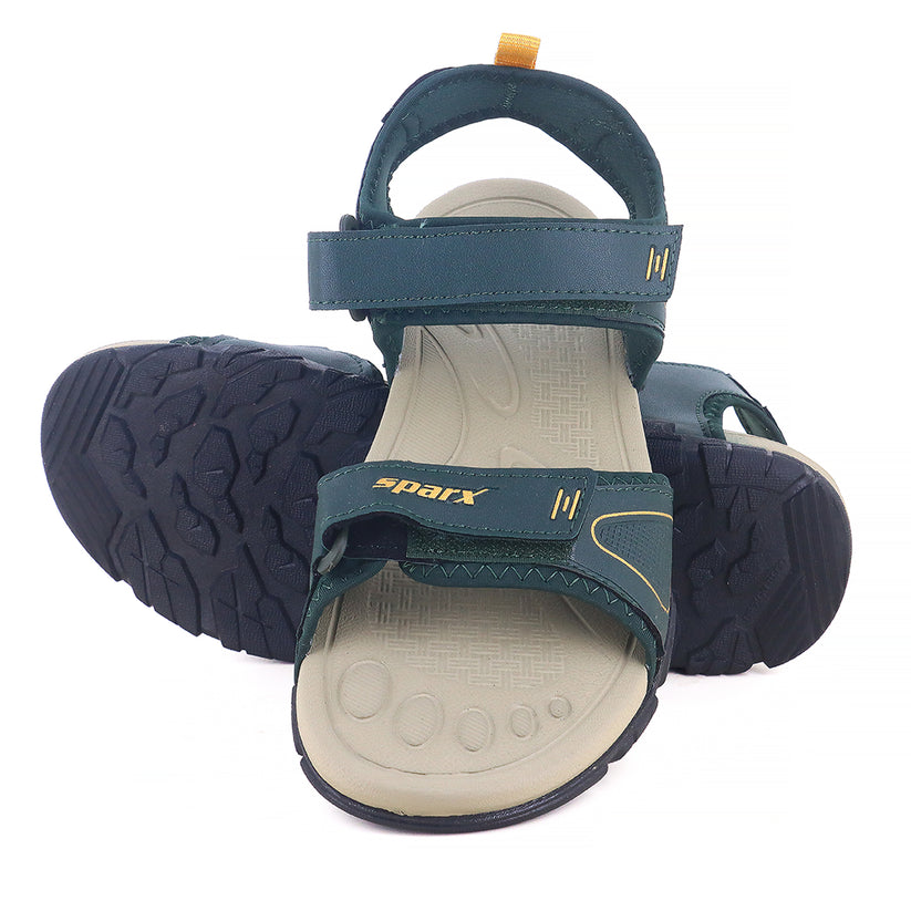 One on one Image of Beautiful and attractive Sandals for Men with white background and clear visibility.  With Yellow X (Sparx) logo visible on it. 