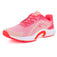 Iimage of women's athletic shoe in shades of pink and coral, with a white sole and a prominent "X" logo on the side. By Sparx and white background available.