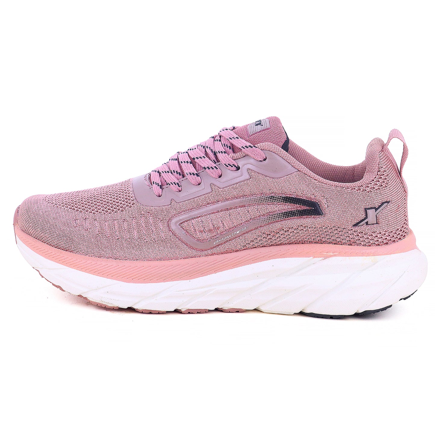 The side image of Sparx shoes for women available in pink colour with white bottom and with white background. The image looks good and appearance is also very good. 