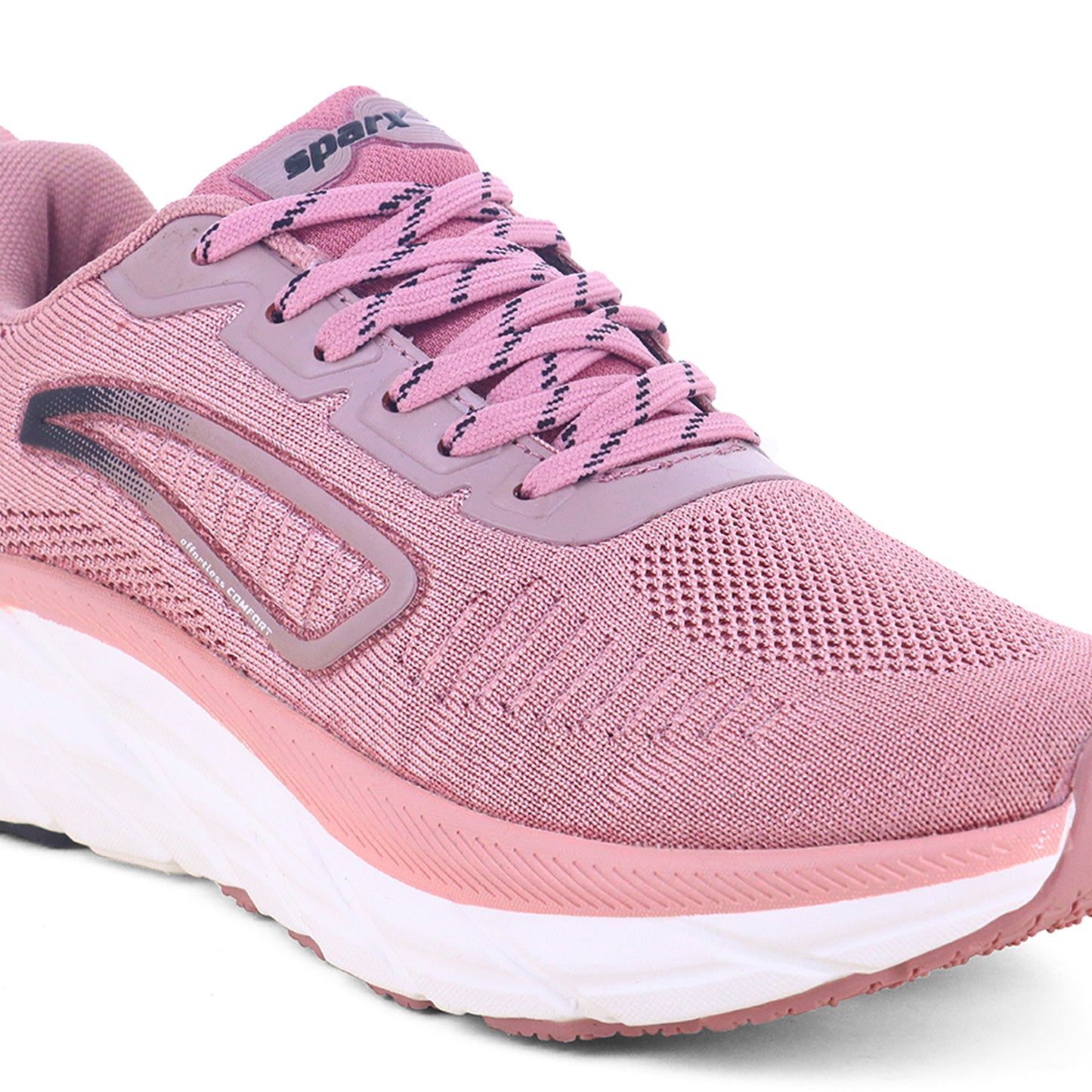 Pink sparx shoes for women with white bottom with white background available in different colour combinations and can be used for sports activities etc. 