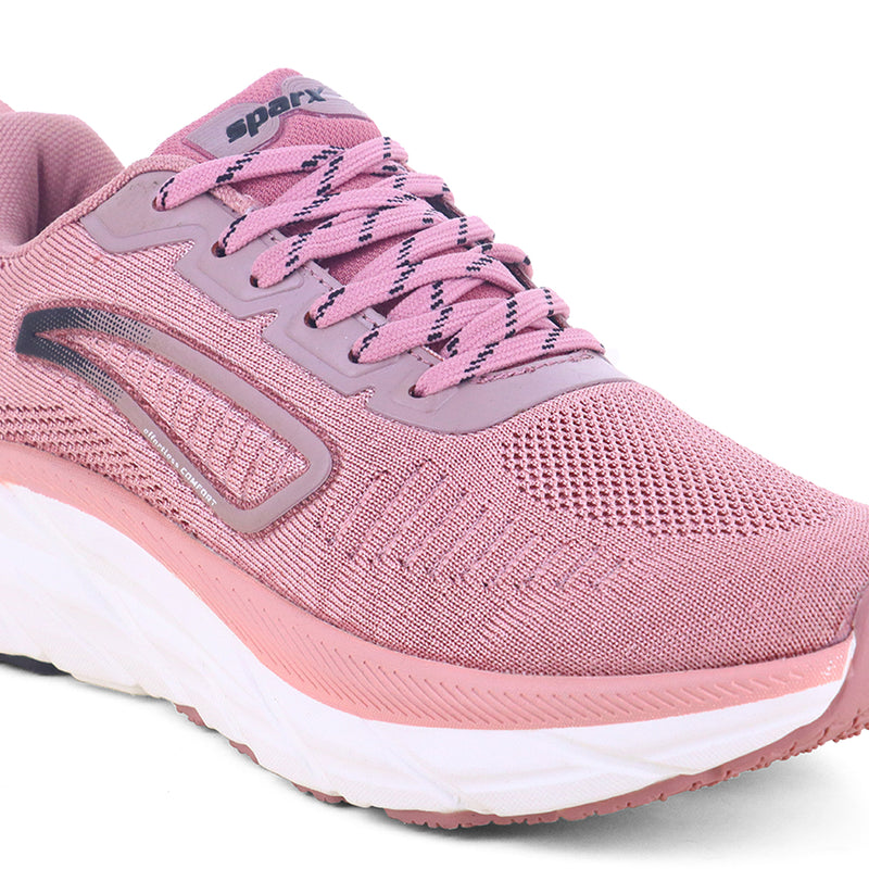 Pink sparx shoes for women with white bottom with white background available in different colour combinations and can be used for sports activities etc. 