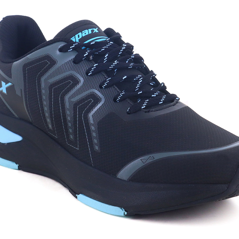 Black and sage green Sparx running shoe rear view